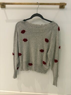 Gray Off-the-Shoulder Sweater with Red Lip Appliqués